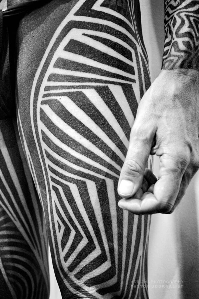 blackwork by lewis black symmetry, photo copyright adriana de barros