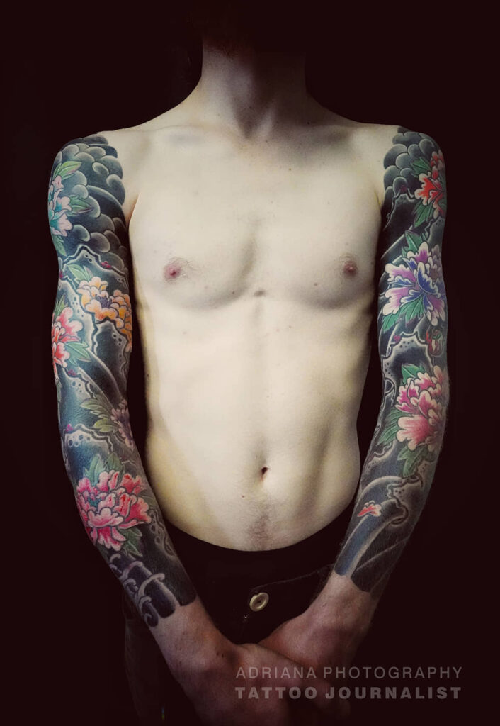 japanese flower tattooed sleeves by junii,  photo copyright adriana de barros